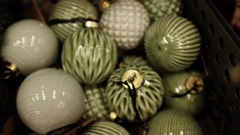 Modern and trendy green ceramic Christmas ornaments. Traditional Xmas tree decor Stock Footage 320971346