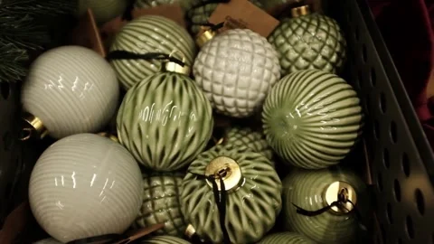 Modern and trendy green ceramic Christmas ornaments. Traditional Xmas tree decor Stock Footage 320971445