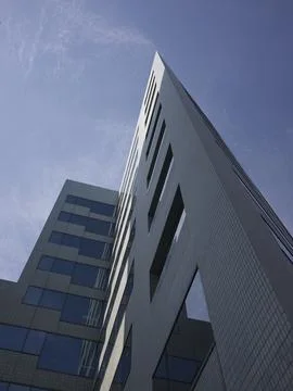 Modern angular office towers and empty city streets, Japan Stock Photos
