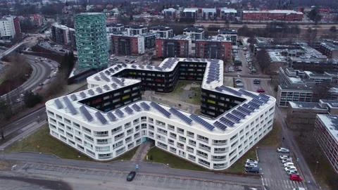 Modern angular shaped apartment building in urban environment. Ascending Vídeos de archivo 232674376