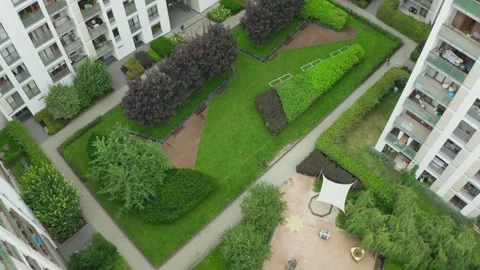 Modern Apartment Complex Courtyard with Playground and Green Spaces Video stock 309297183