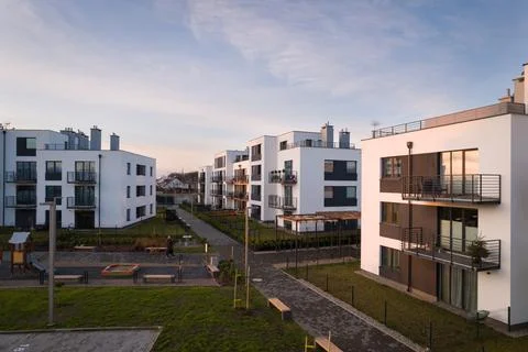 Modern Apartment Complex with Shared Outdoor Space Stock Photos