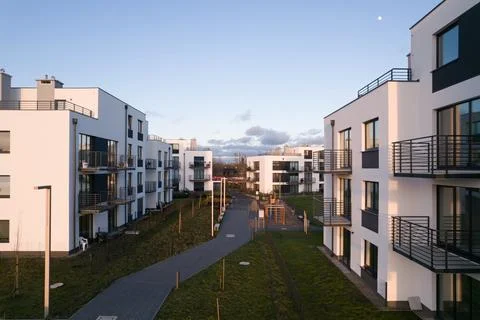 Modern Apartment Complex with Shared Outdoor Space Stock Photos