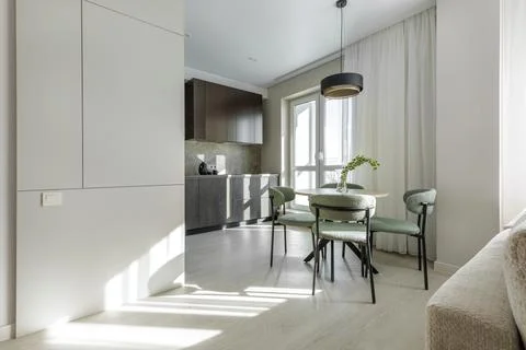 Modern Apartment Interior with Kitchen, Dining Area, and Living Zone Stock Photos