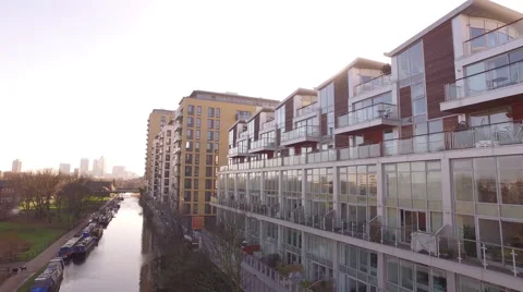 Modern Apartments alongside a canal - drone footage Stock Footage 68141953