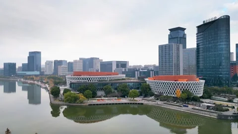 Modern Architectural Complex by the Lake in Zhenhai District, Ningbo, China Stock Footage 346795810