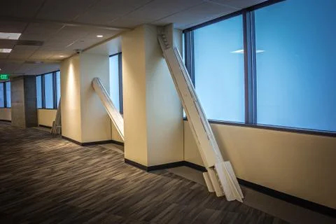 Modern architectural design ahllway with structural painted columns and braci Stock Photos