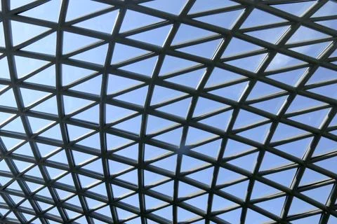 A modern architectural design featuring a triangular glass roof, maximizing.. Foto stock