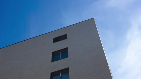 A modern architectural design featuring windows against the skyline, animation Stock Footage 341589836