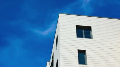 A modern architectural design featuring windows against the skyline, animation Stock Footage 341592185