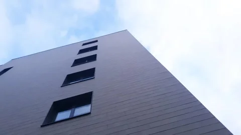 Modern architectural design featuring windows against the backdrop skyline. Stock Footage 344964202