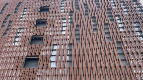 Modern Architectural Facade with Geometric Patterned Building Exterior Stock Footage 337722248