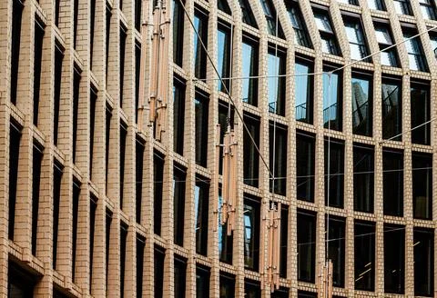 Modern Architectural Facade with Grid Pattern Stock Photos