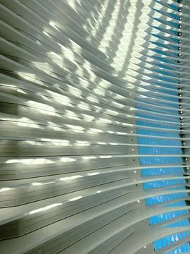 Modern Architectural Interior with Sunlit Patterns Stock Photos