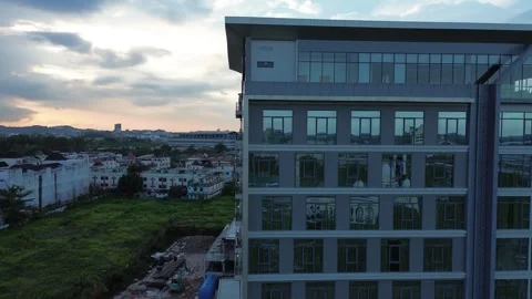 Modern Architectural Progress: Aerial Glimpse of a Contemporary High-Rise A.. Video stock 325262902