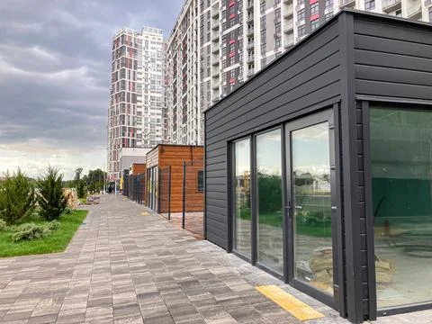 Modern architectural scene with two structures a high-rise and a modular un.. 스톡 사진