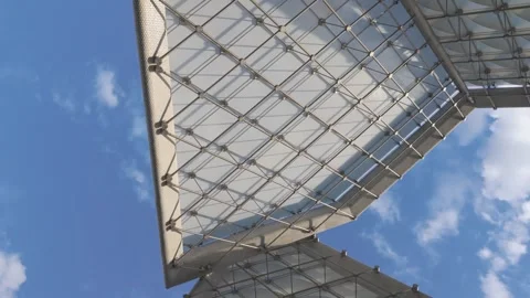 Modern architectural structure featuring a striking geometric grid pattern .. Stock Footage 313730571