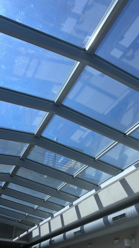 Modern architectural transparent glass ceiling panel provides an interior view, Stock Footage 333375323