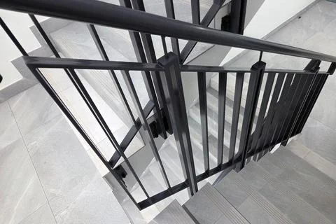 Modern Architecture and Design Featuring a Geometric Staircase with Metal Stock Photos