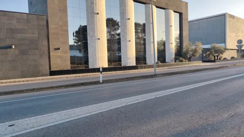 Modern architecture building and empty city street at sunrise Vídeo Stock 340326670