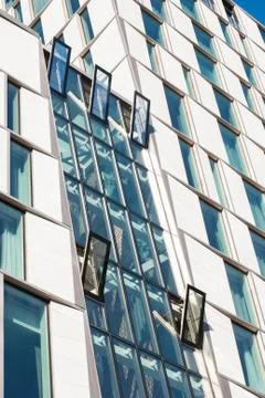 Modern architecture building with open windows Stock Photos