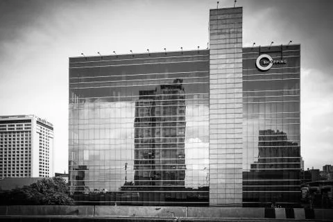 Modern architecture close up with mirror window reflections of building 写真素材