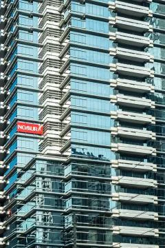 Modern architecture close up with mirror window reflections of building Stock Photos