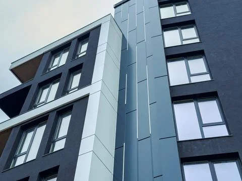 Modern architecture features sleek lines and contrasting colors against a c.. Stock Photos
