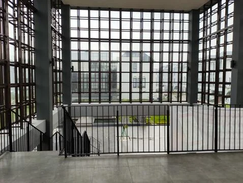 Modern Architecture Interior with Large Windows and Urban View Stock Photos