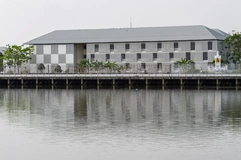 Modern architecture reflected in tranquil waters urban landscape calm envir.. Stock Photos