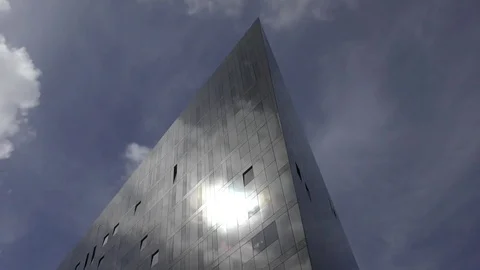 Modern architecture reflective highlight moving clouds Stock Footage 74474944