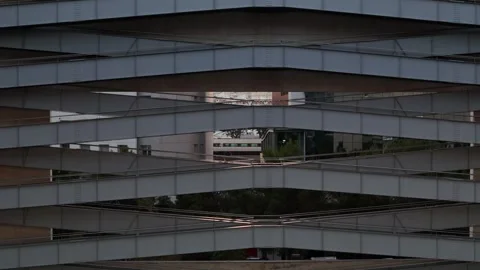 Modern architecture showcases unique design features in urban setting at sunset Stock Footage 318462450