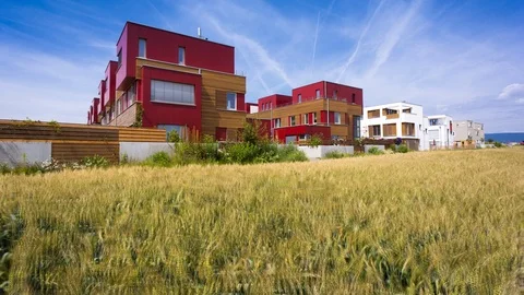 Modern architecture a  wheat field in foreground, ANIMATED STILL PHOTO Stock Footage 80724038