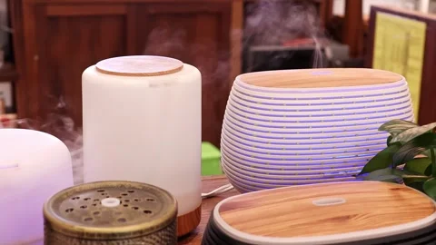 Modern Aroma Diffusers and Essential Oil Fragrance Devices Stock Footage 337736214