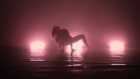 Modern artist performing expressive dance elements Video stock 144354737