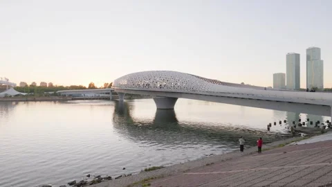 The modern Atyrau bridge and the St. Regis in Astana Stock Footage 346573121