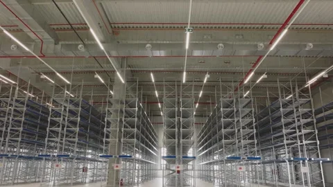 Modern automated warehouse interior with empty storage shelving racks in la.. Stock Footage 337524554