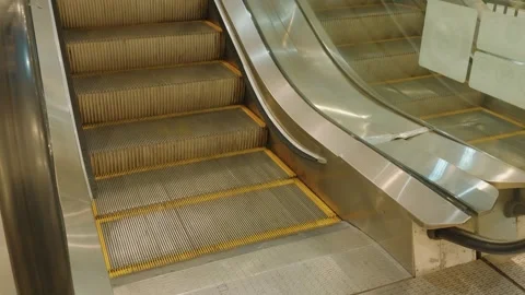 Modern automatic escalator stairs inside a public building Video stock 343415524