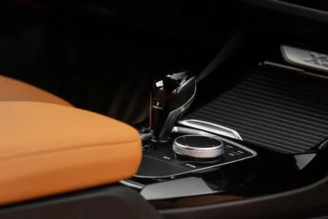 Modern automatic gearbox. Close up of the gearbox transmission handle. Automa Stock Photos