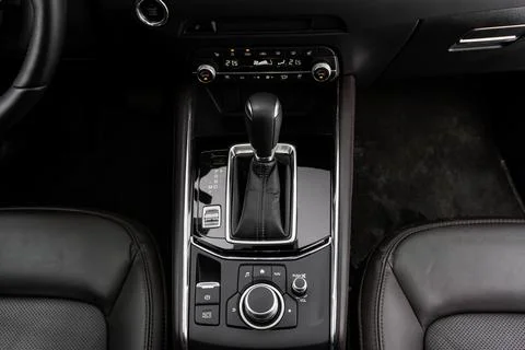 Modern automatic gearbox. Close up of the gearbox transmission handle. Automa Stock Photos