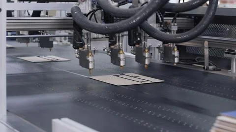 Modern automatic machine line of cardboard box. Offset printing machine - Stock Photos