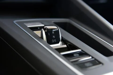 Modern automatic transmission lever on the passenger car console Stock Photos