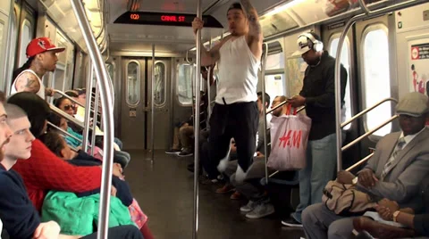 Modern b-boys dancing in a NYC subway car. Stock Footage 37388879