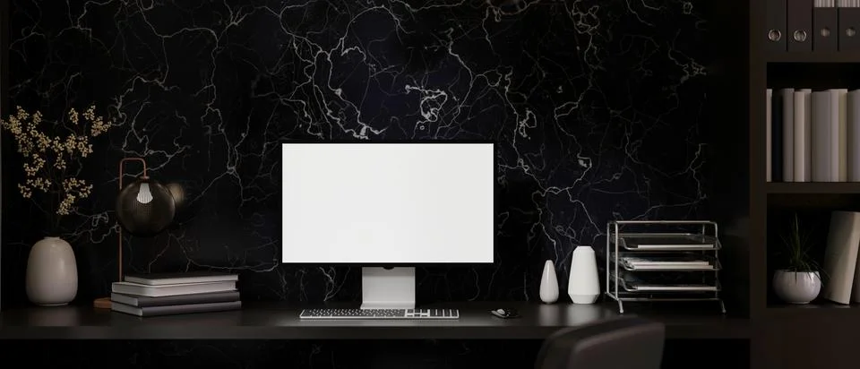 A modern back home office with a computer mockup on a black table against t.. Stock Illustration