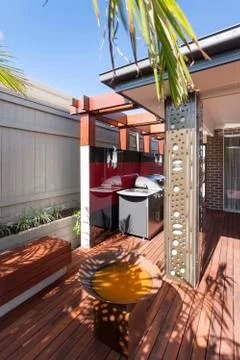 A modern backyard kitchen with outside grill Stock Photos