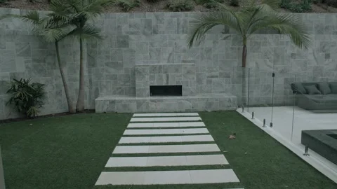 Modern Backyard With Palm Trees and Stone Patio in Sunshine Coast, Australia Stock Footage 341313883