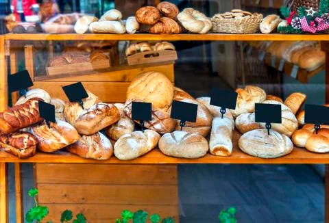Modern bakery with assortment of different bread Stock Photos