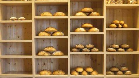 Modern bakery with different kinds of bread, cakes and buns Stock Footage 74333406