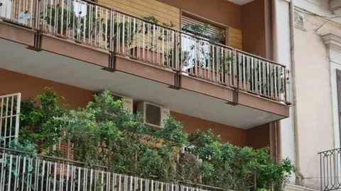 Modern balconies with green plants in Bari in Italy Stock Footage 150082653