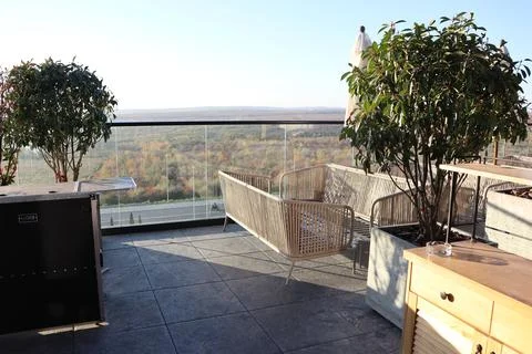 A Modern Balcony Designed for Enjoying a Scenic View with Stylish and Elegant Stock Photos